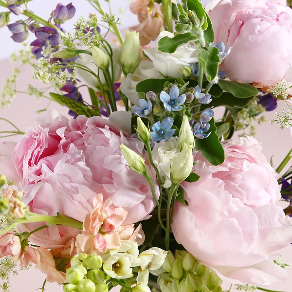 Field bouquet with pink peonies
