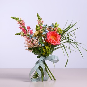 Field bouquet with coral peony