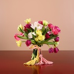 Bright bouquet of tulips and ranunculus