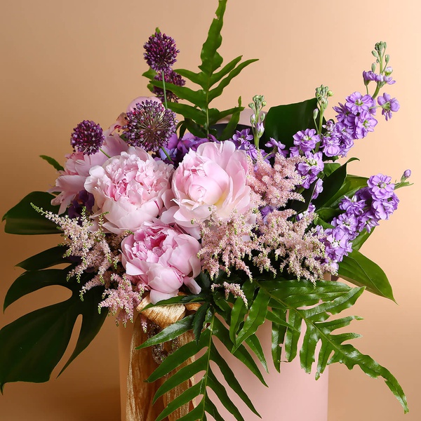 Delicate composition with peonies and hydrangea
