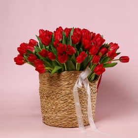 The arrangement «101 Tulips in a Natural Basket»