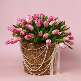The arrangement «101 Pink Tulips in a Pearl Veil»