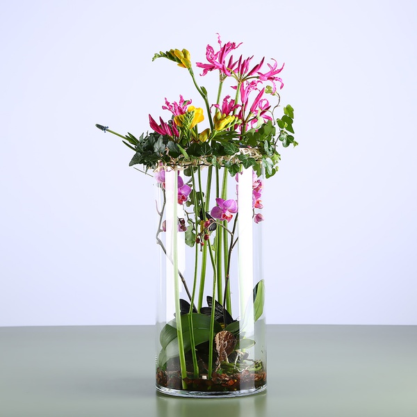 Floral composition in a vase with butterflies