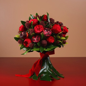 Bouquet of roses and pomegranate