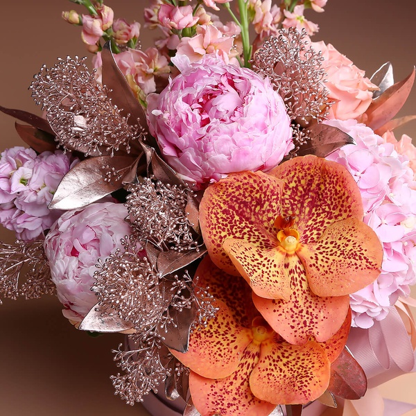 Floral composition in pink and peach tones