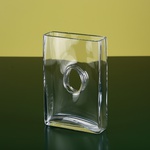 Glass vase with decorative hole