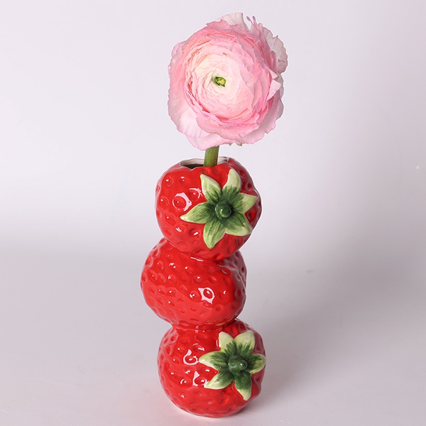 Vase of strawberries