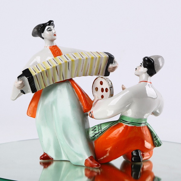 Vintage porcelain figurine "Dancer and Harmonica Player"