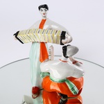 Vintage porcelain figurine "Dancer and Harmonica Player"