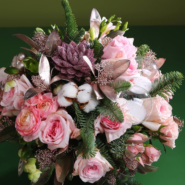 Winter bouquet of roses and ranunculus