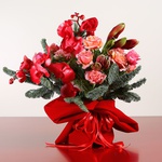 Bouquet in scarlet tones with phalaenopsis