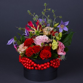 Ethno composition with beads in a black box