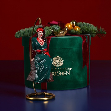 Ceramic figurine "Solokha" in a green dress