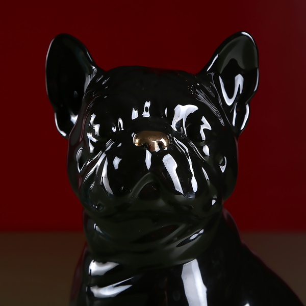 French Bulldog sitting, gloss black