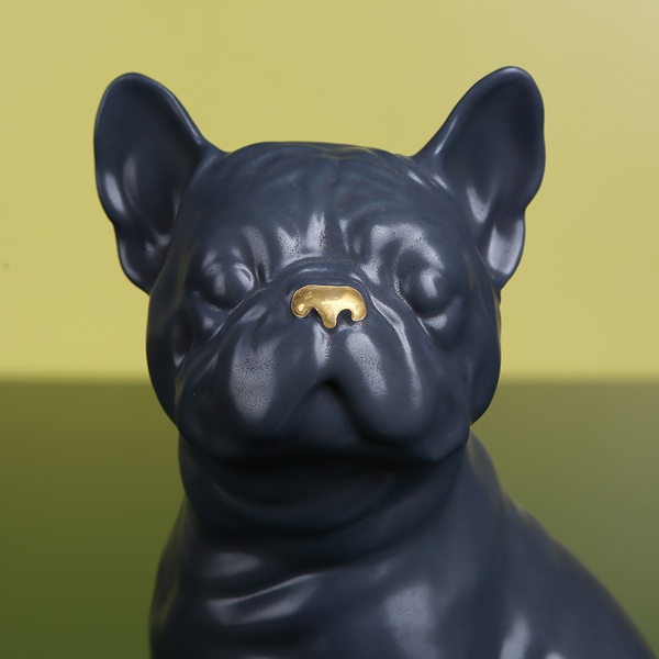 French Bulldog sits, black