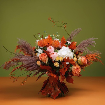 Bouquet with orange thuja