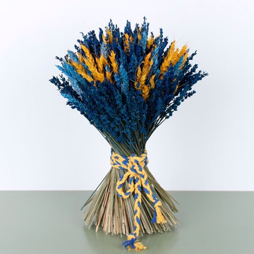 Yellow-blue bouquet of dried flowers