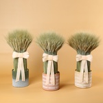 The dried flower arrangement in a pot “Warm Touch of Nature”