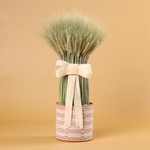 The dried flower arrangement in a pot “Warm Touch of Nature”