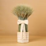 The dried flower arrangement in a pot “Warm Touch of Nature”