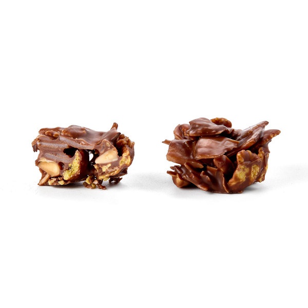 Rocher candies from milk chocolate with coconut and almonds