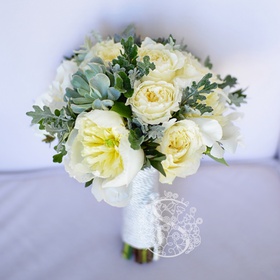 Wedding bouquet with white peonies
