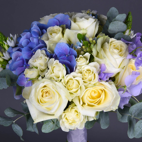 Wedding bouquet with blue latirus