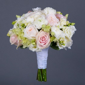 Wedding bouquet with ranunculus and delicate roses