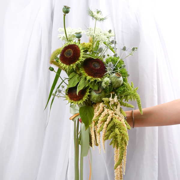 «Forest Bride» is a wedding bouquet of sunflowers and amaranth