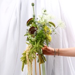 «Forest Bride» is a wedding bouquet of sunflowers and amaranth