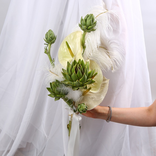 «Art Bride» is a wedding bouquet of anthuriums and artichokes with feathers