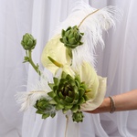 «Art Bride» is a wedding bouquet of anthuriums and artichokes with feathers