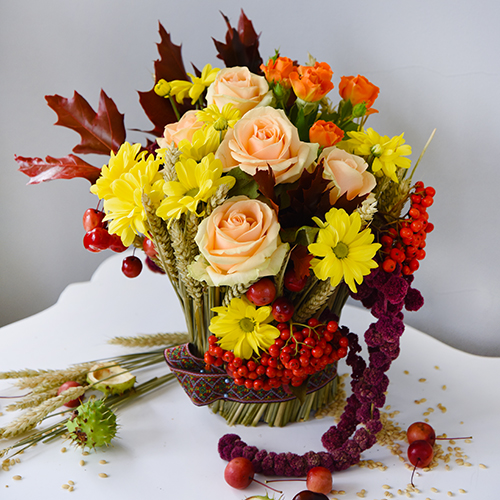 Flower arrangement "Abundant geometry" on a bouquet holder